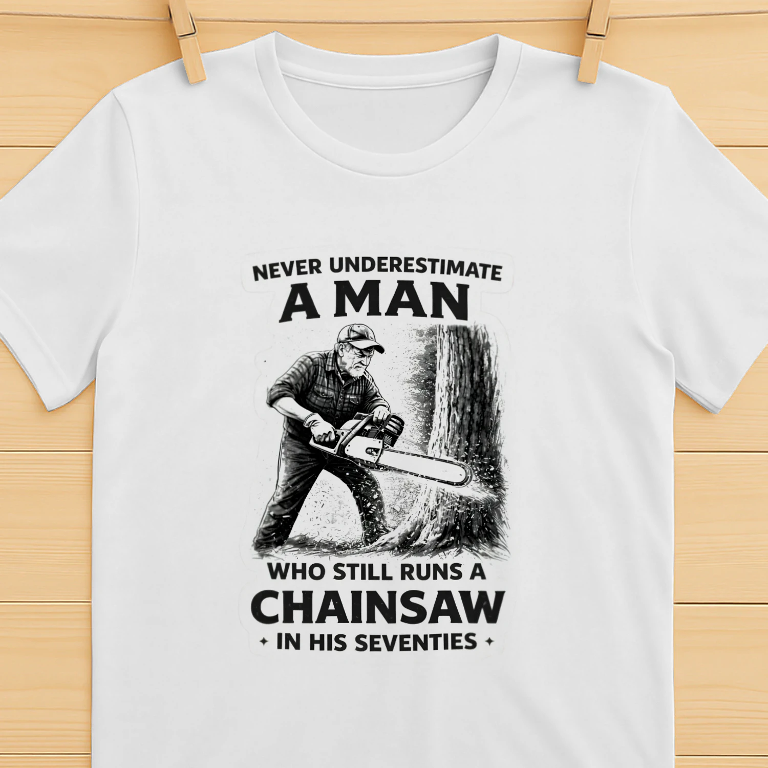 Never Underestimate An Man Who Still Runs A Chainsaw In His Seventies t-shirt