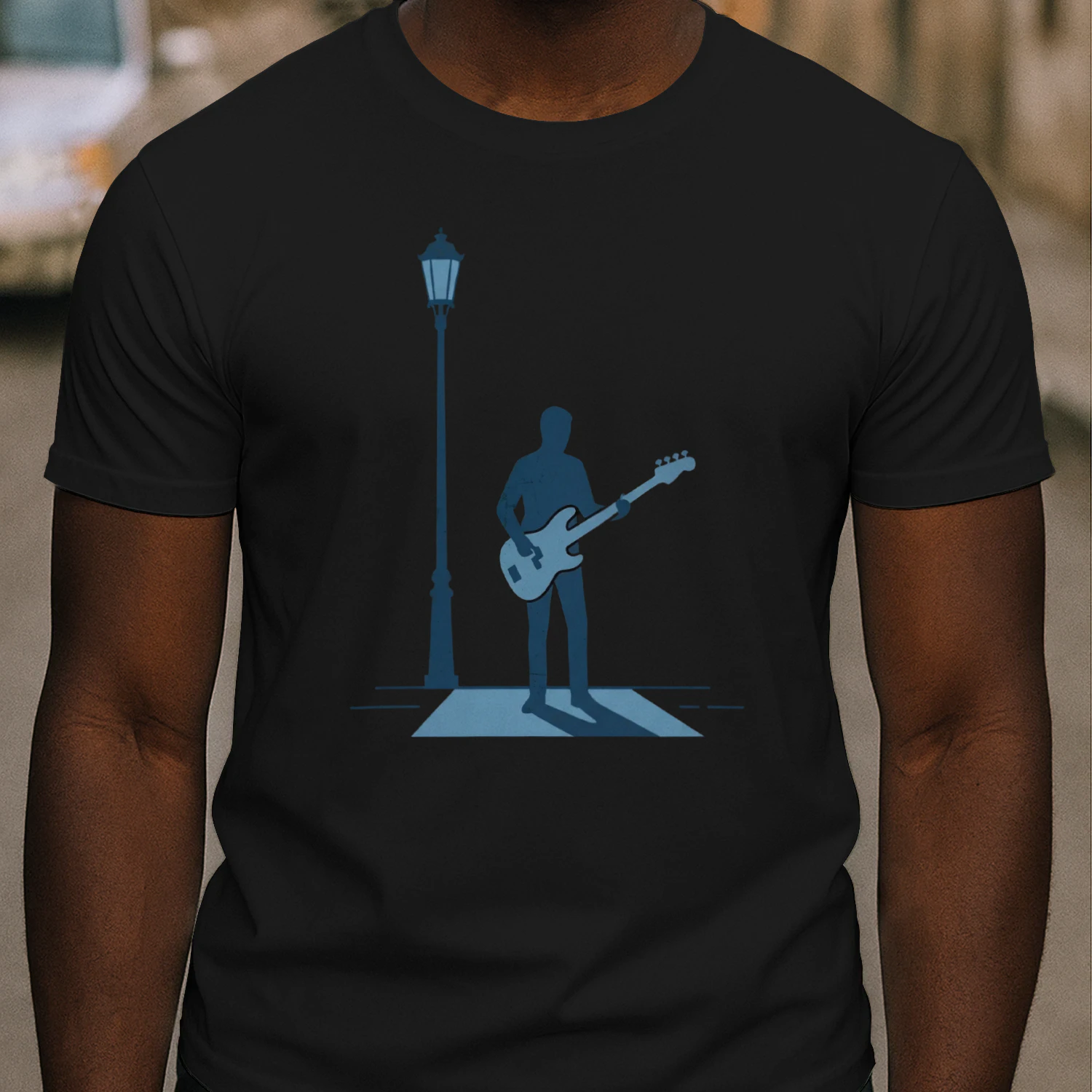 Moody Bassist Under Light T-Shirt