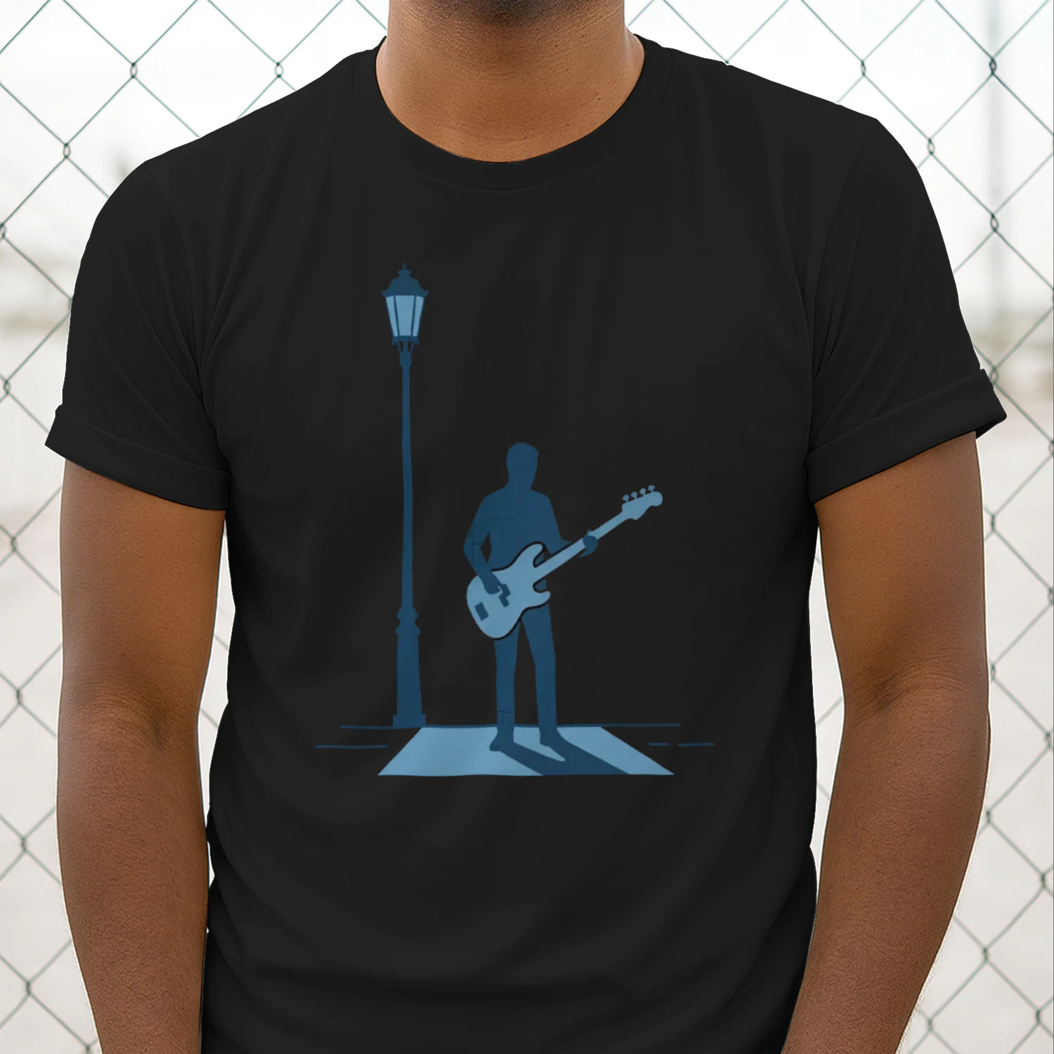 Moody Bassist Under Light T-Shirt