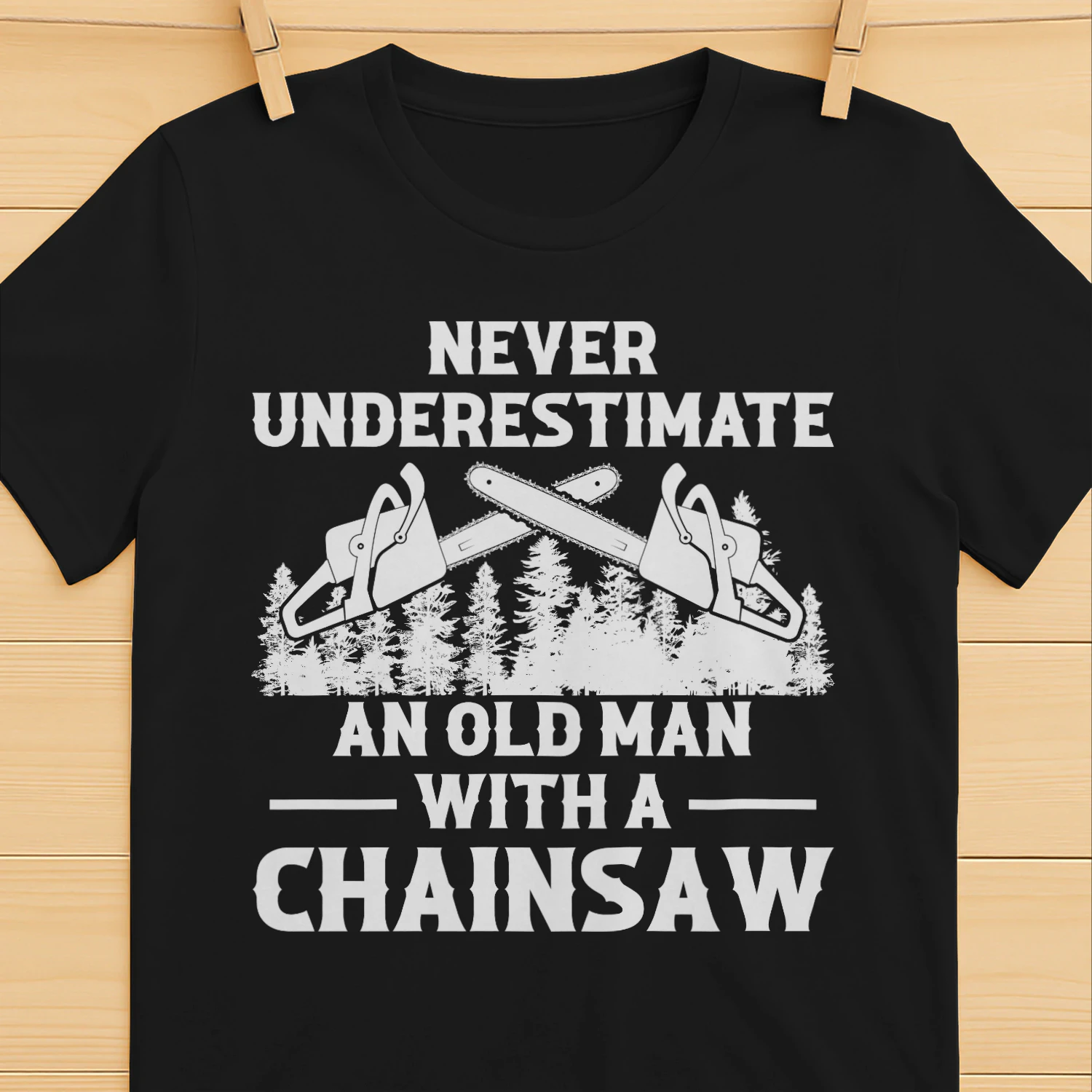 NEVER UNDERESTIMATE AN OLD MAN WITH A CHAINSAW