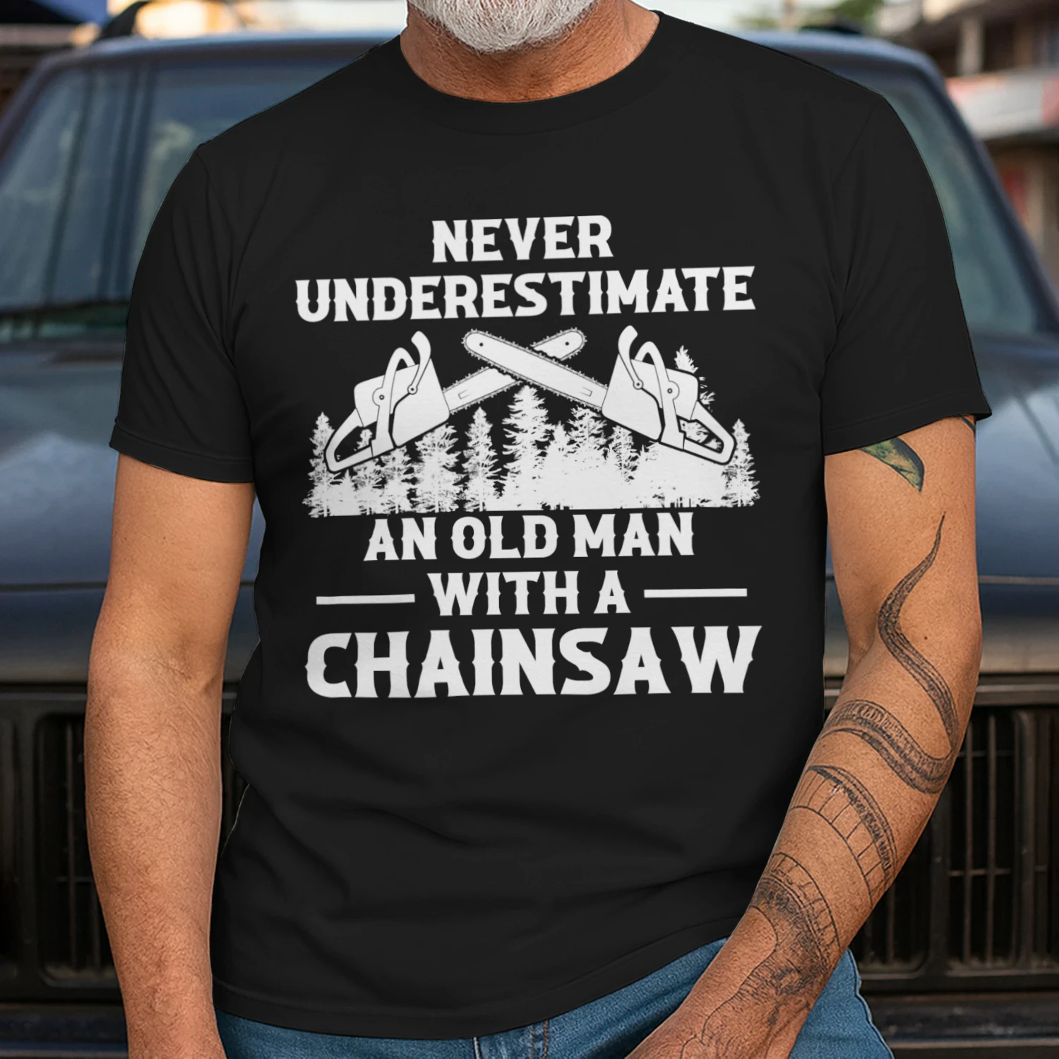 NEVER UNDERESTIMATE AN OLD MAN WITH A CHAINSAW