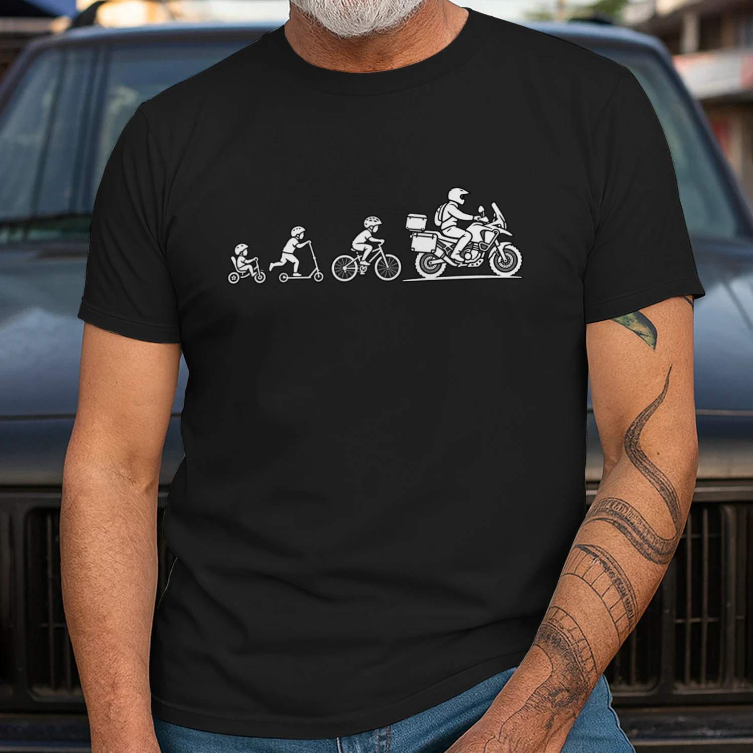 Evolutie van de motorrijder – Unisex Adventuremotor T-shirt