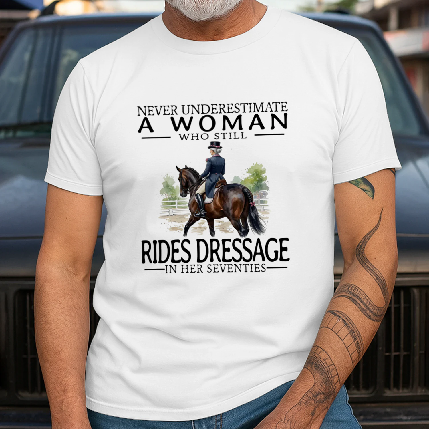 NEVER UNDERESTIMATE A WOMAN WHO STILL RIDES DRESSAGI IN HER SEVENTIES