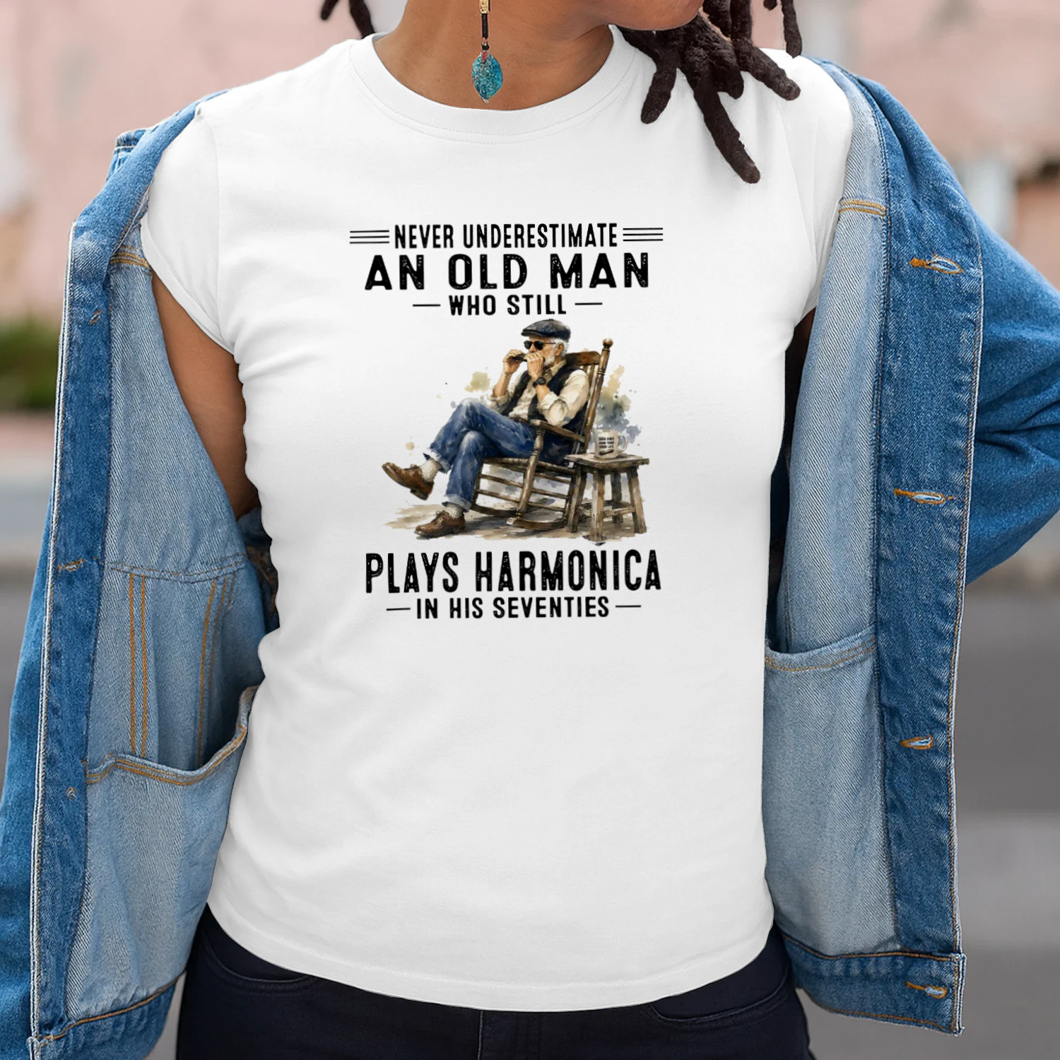 NEVER UNDERESTIMATE AN OLD MAN WHO STILL PLAYS HARMONICA IN HIS SEVENTIES