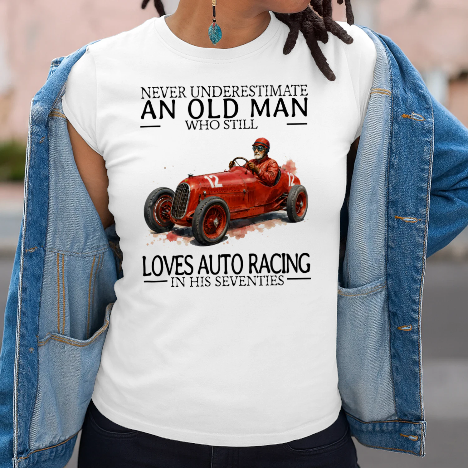 LOVES AUTO RACING IN HIS SEVENTIES