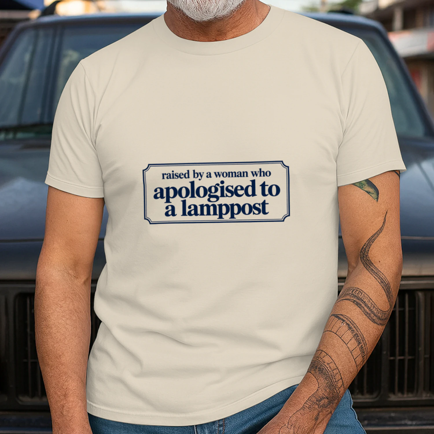 Raised by a Woman Who Apologised to a Lamppost T-Shirt