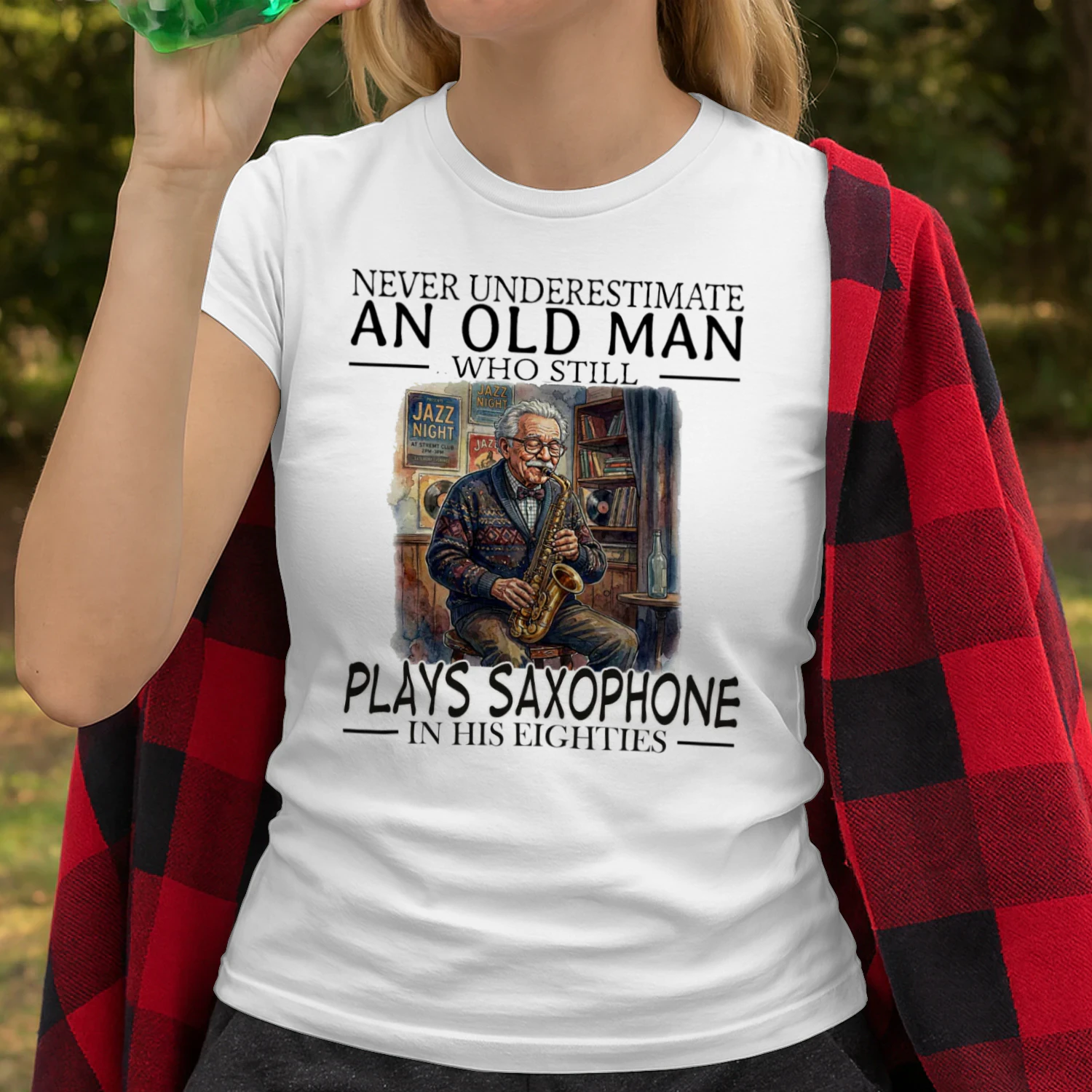 PLAYS SAXOPHONE
